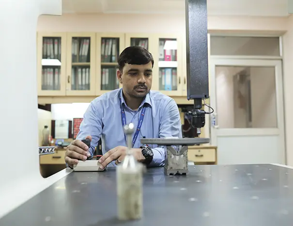 Quality inspection of a chassis component at an Indian automotive manufacturing plant