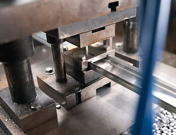Close-up of press-shop tooling engineered for precision sheet-metal forming