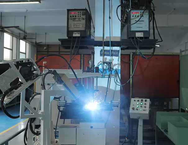 Robotic welding cell used for engine sub-assembly production