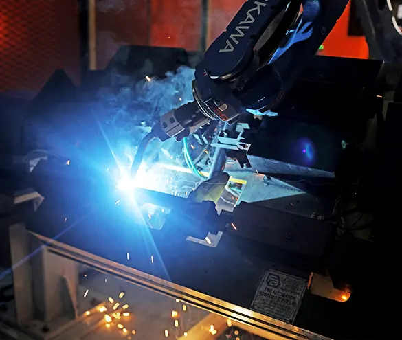 Robotic welding cell joining a chassis sub-assembly