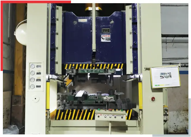 Press forming of a structural chassis frame member