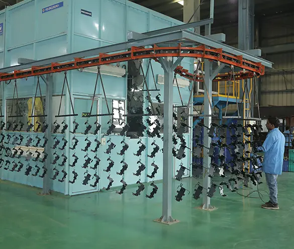 Steel components on a conveyorised powder-coating line