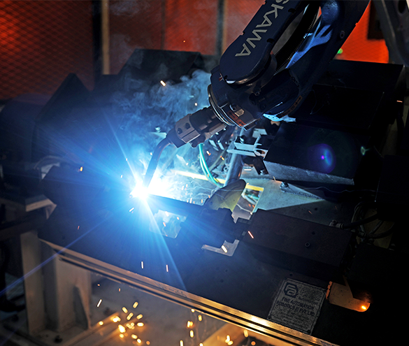 Robotic and manual weld assembly of tractor parts sub-assemblies