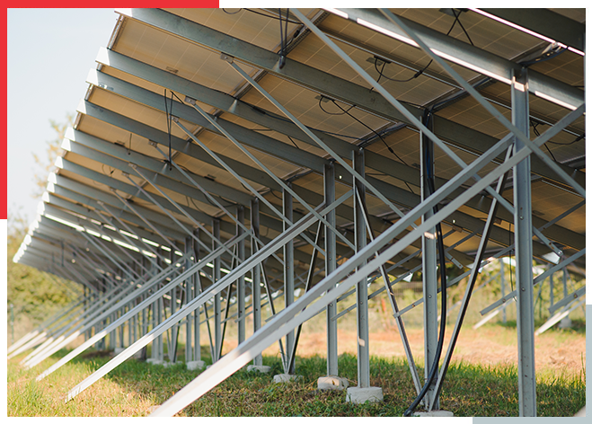 Steel mounting structure supporting solar panels at a ground-mount solar plant
