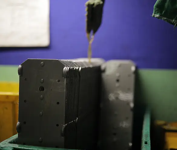 Stamped steel components ready to be welded into sub-assemblies