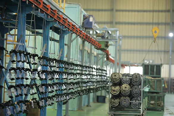 Steel components on an electro-deposition coating line for corrosion protection