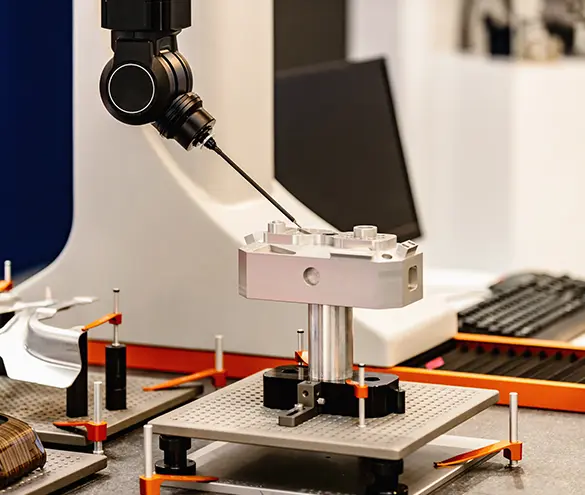 Coordinate measuring machine checking a pressed steel component