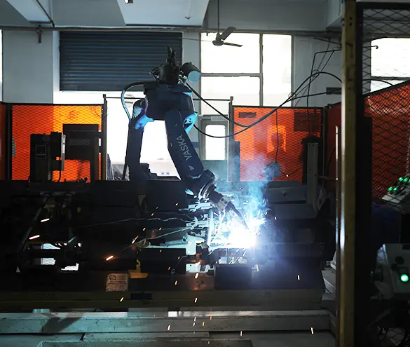 Robotic welding of an automotive steel frame sub-assembly